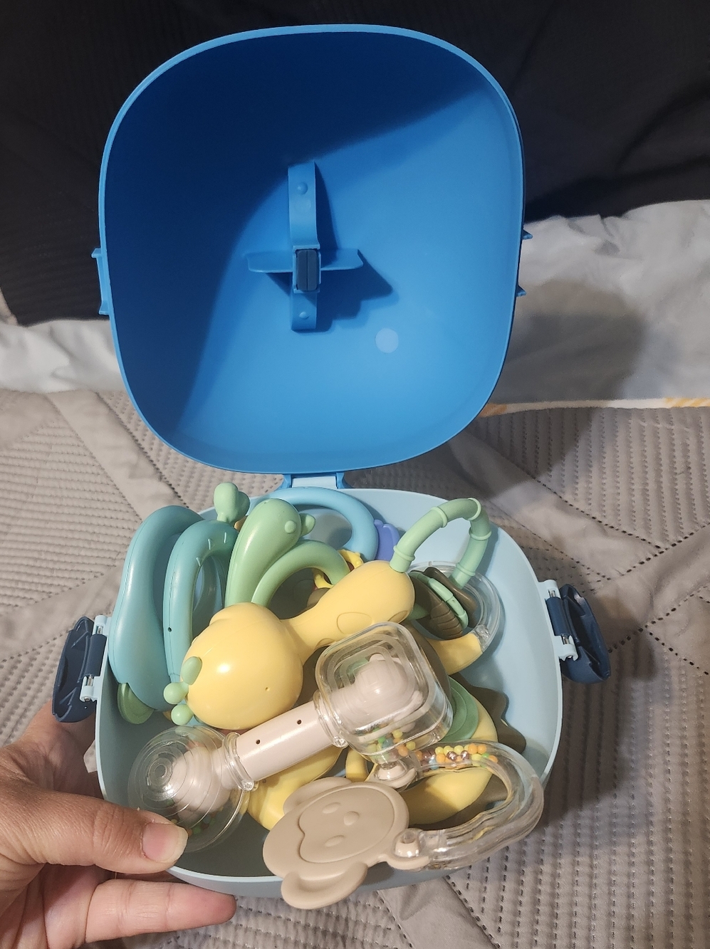 Blue Portable Baby Toy Storage Case with Green and Yellow Rattles